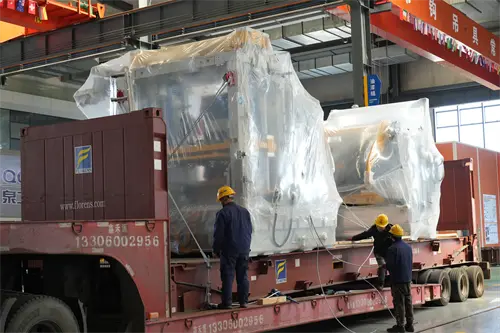 Macchine per la produzione di mattoni QGM spediti all'estero: aiutare la costruzione urbana globale e creare un futuro verde